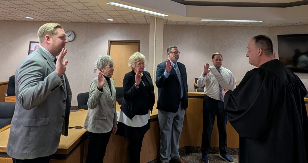 After his recent election, Judge DeLeone swearing in his Administration and HR Departments.