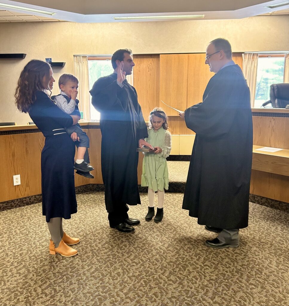 Matthew Hebebrand being sworn in as a Magistrate