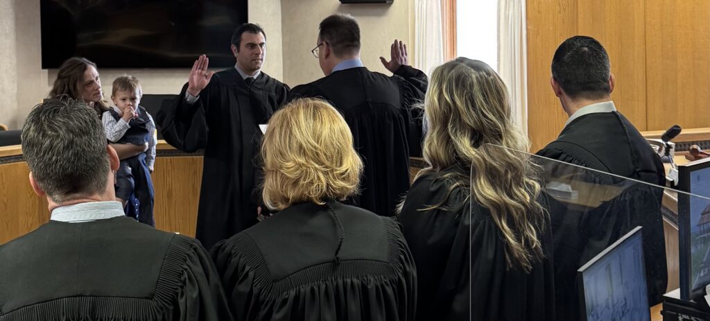 Matthew Hebebrand being sworn in as a Magistrate
