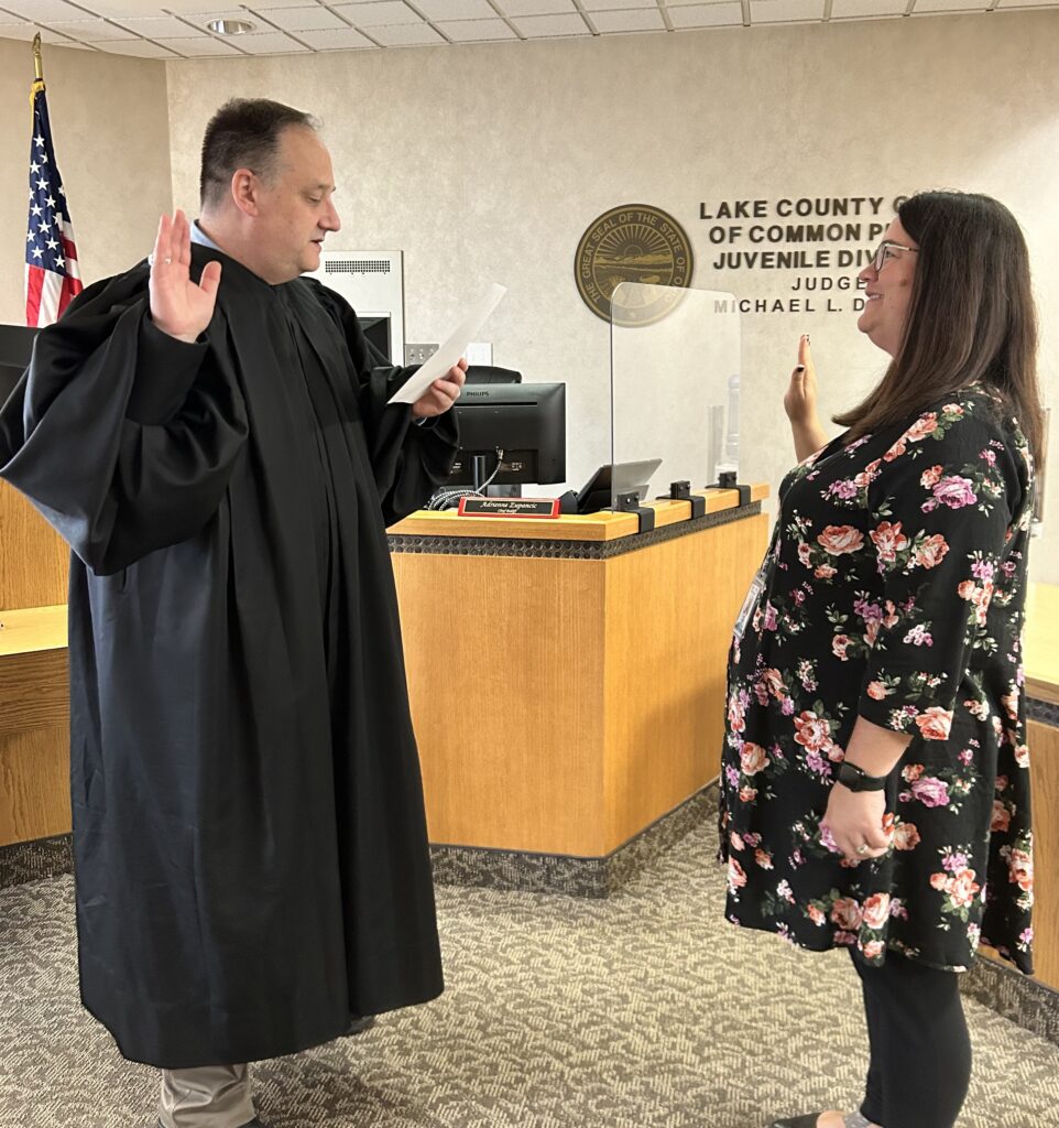 Judge DeLeone swearing in Sharon Delembo as a Juvenile Court Deputy Clerk