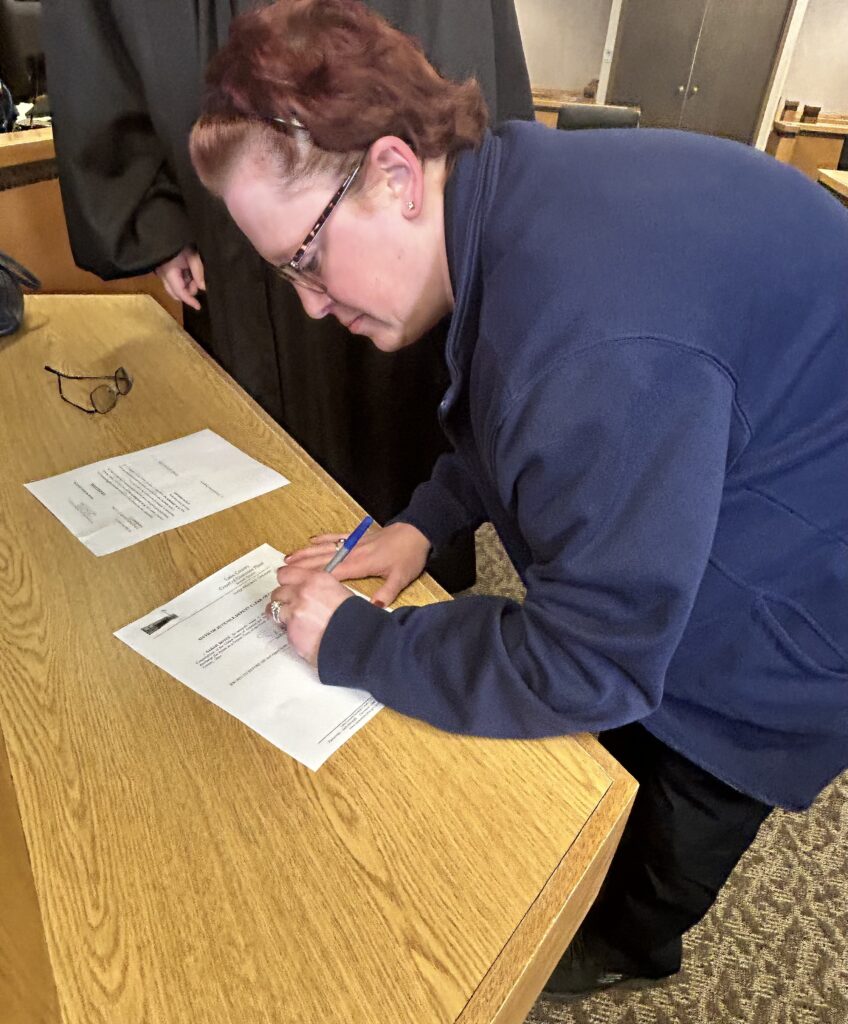 Judge DeLeone swearing in Sarah Boyce from Willowick Police Department