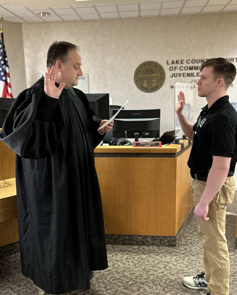 Judge DeLeone swearing in a Juvenile Corrections Officer