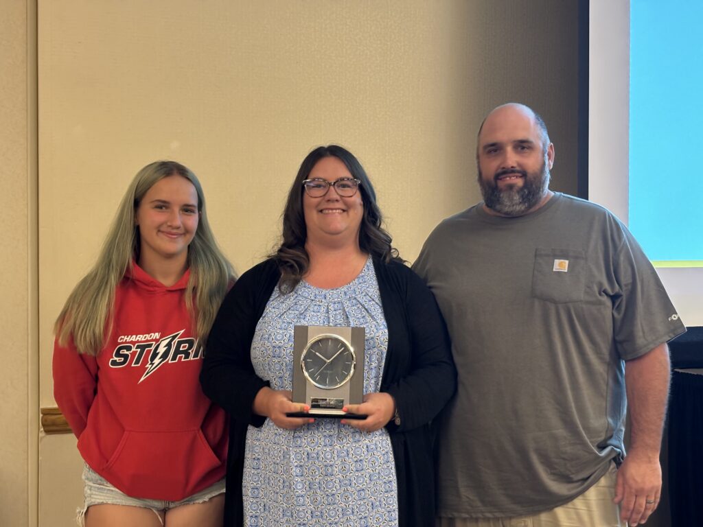 Juvenile Court Clerk, Sharon Delembo and her family, with Ohio Juvenile Clerk’s Association Clerk of the Year award