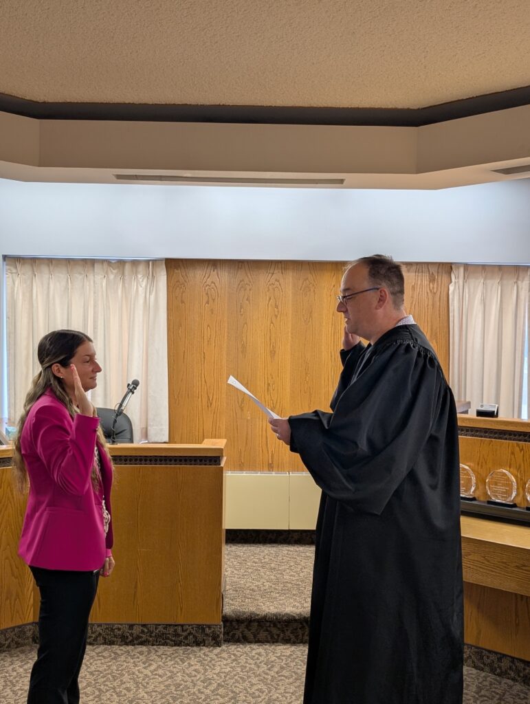 Arial Birtley being sworn in as a Juvenile Court Intake Officer by Judge DeLeone
