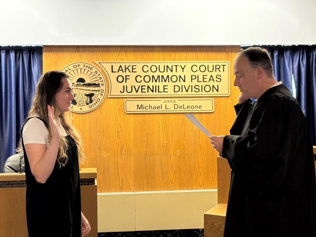 Judge DeLeone swearing in Caitlin Dems as a Juvenile Court Intake Officer.